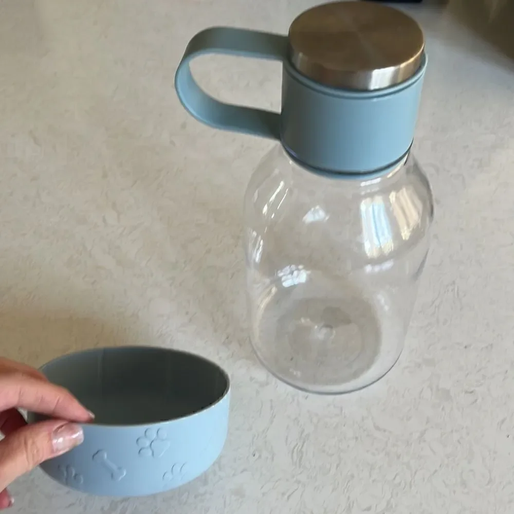 Doggie water bottle with detachable base bowl for breaks during long walks